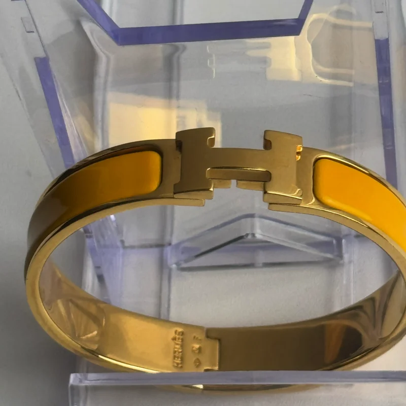 Pre Owned Hermes Enamel Narrow Clic Clac H Bracelet GM Soleil