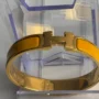 Pre Owned Hermes Enamel Narrow Clic Clac H Bracelet GM Soleil
