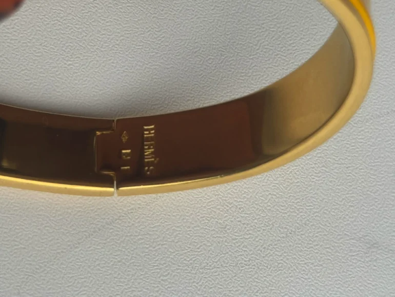 Pre Owned Hermes Enamel Narrow Clic Clac H Bracelet GM Soleil