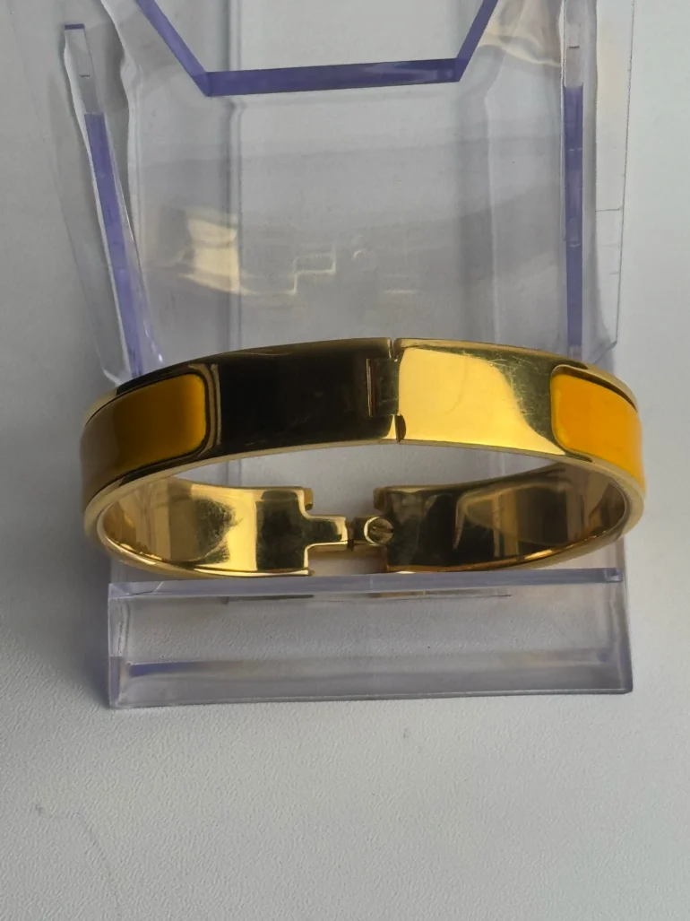 Pre Owned Hermes Enamel Narrow Clic Clac H Bracelet GM Soleil