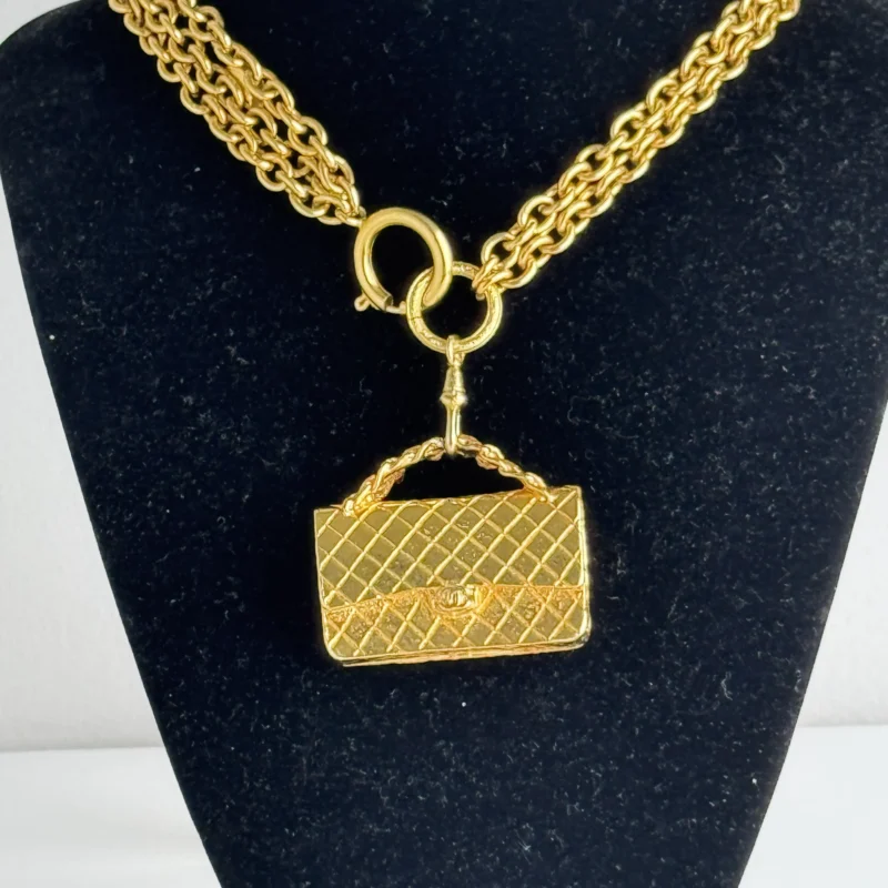 Pre Owned Chanel Multi Strand Matelasse Flap Bag Pendant Necklace 24k Gold Plated