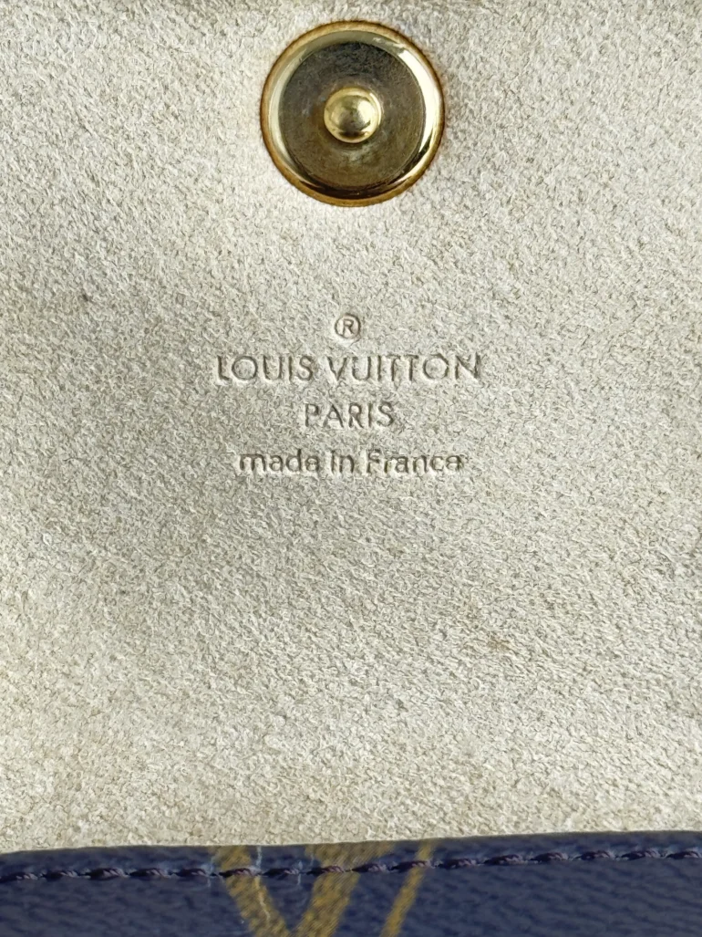 Pre Owned Louis Vuitton Cancun Monogram Pochette Cross body Bag