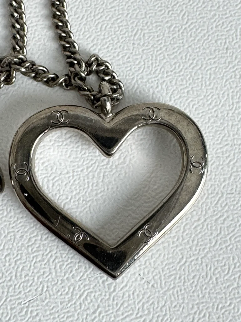 Pre Owned CHANEL Silver CC And Heart Charm Pendant Necklace