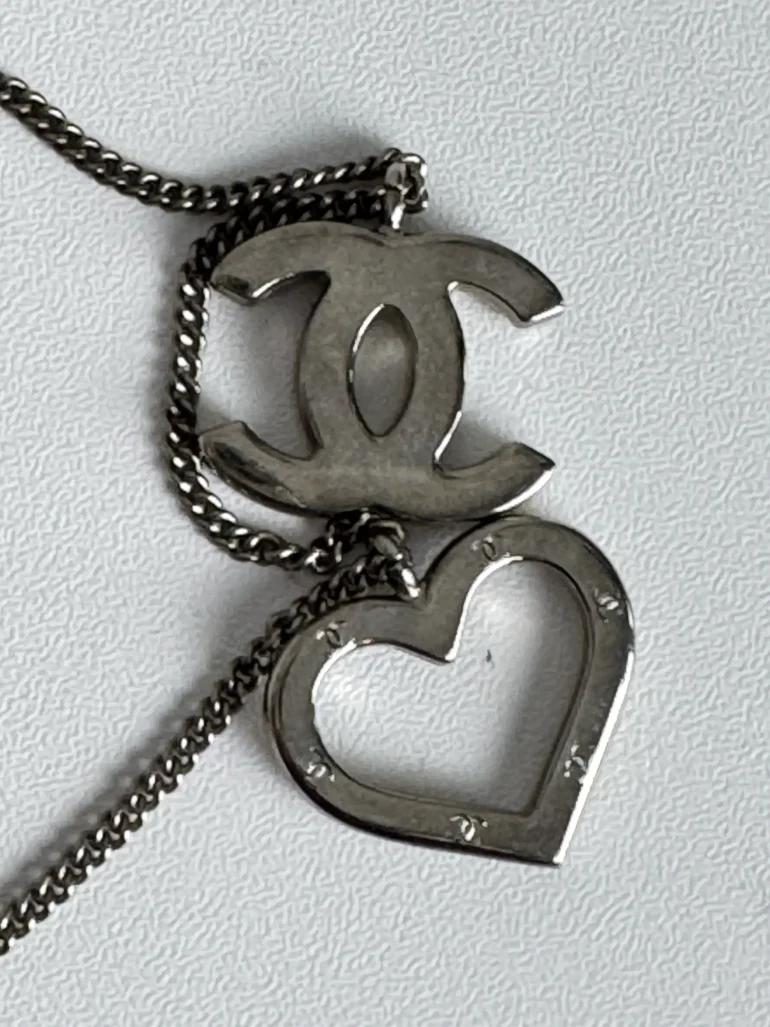 Pre Owned CHANEL Silver CC And Heart Charm Pendant Necklace