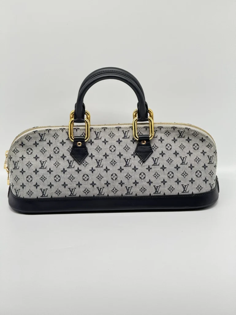 Pre Owned Louis Vuitton Monogram Mini Lin Alma East West Top Handle Tote