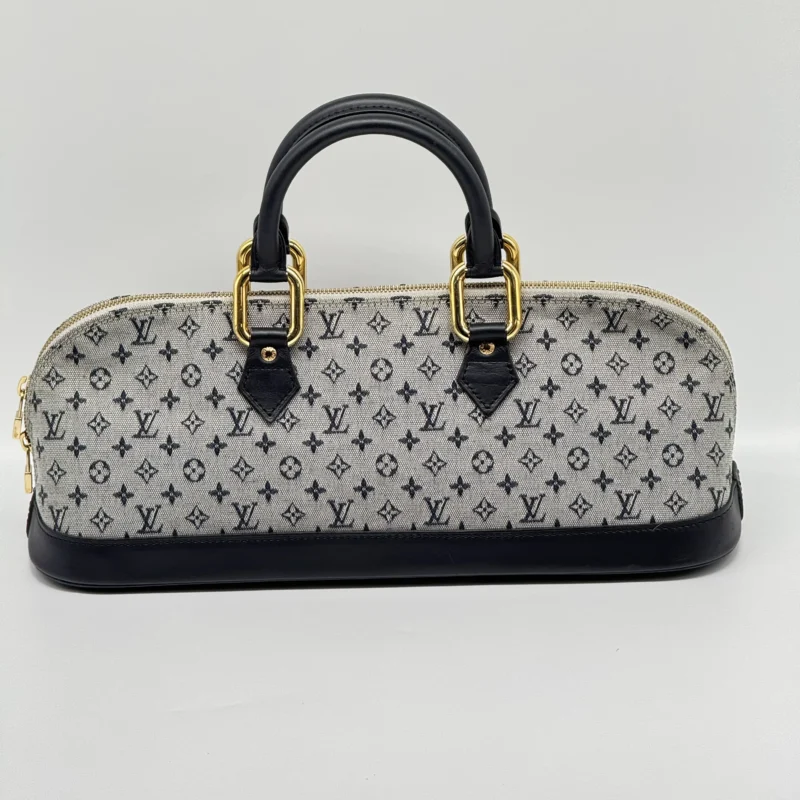 Pre Owned Louis Vuitton Monogram Mini Lin Alma East West Top Handle Tote