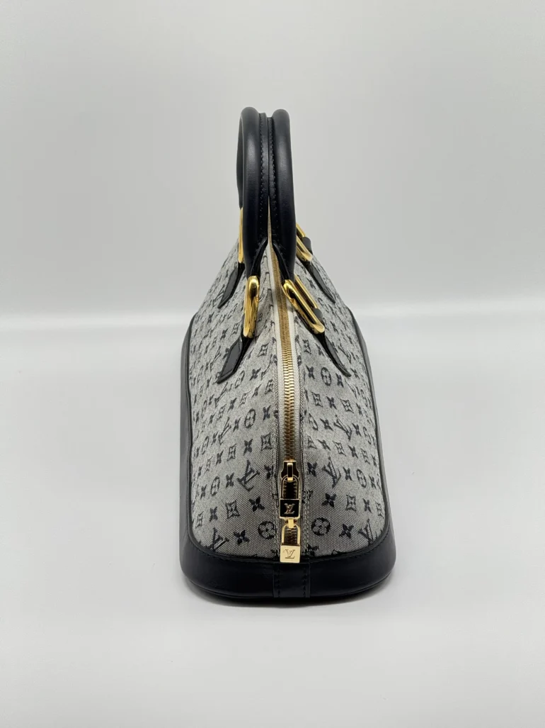 Pre Owned Louis Vuitton Monogram Mini Lin Alma East West Top Handle Tote