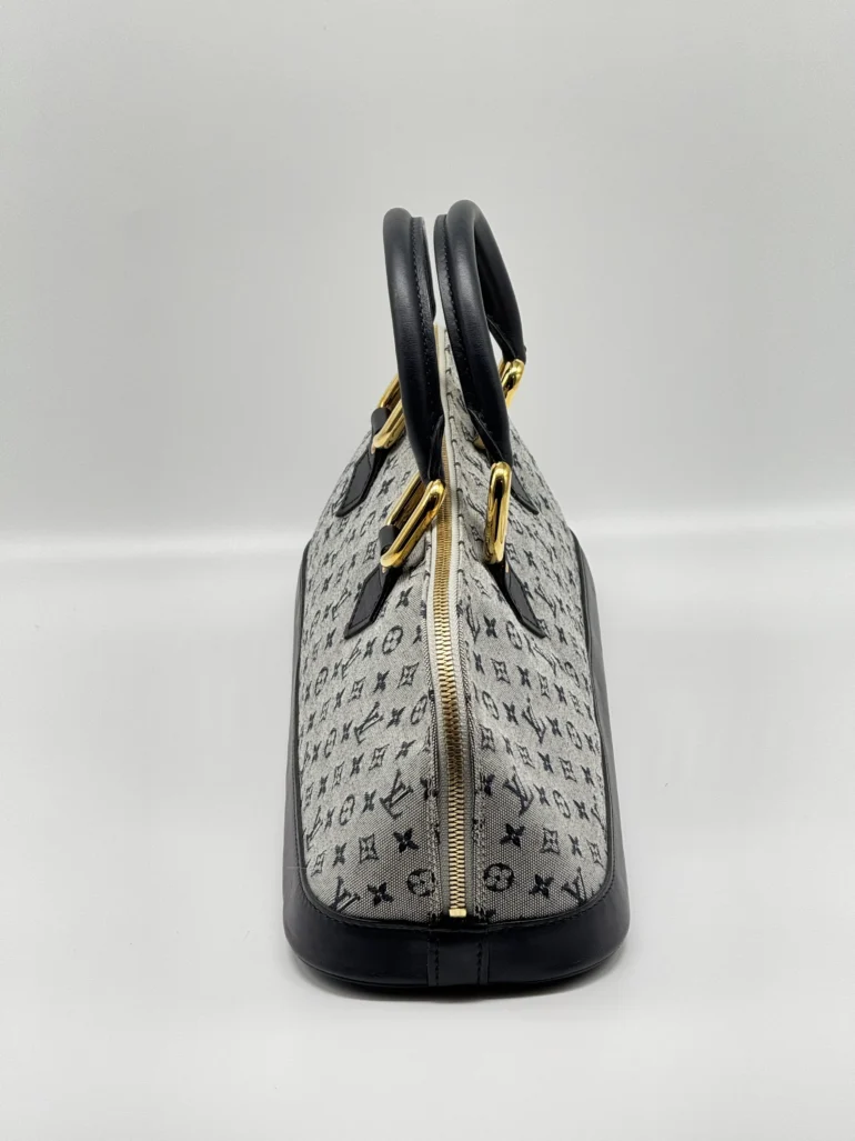 Pre Owned Louis Vuitton Monogram Mini Lin Alma East West Top Handle Tote