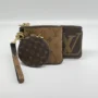 Pre Owned Louis Vuitton Reverse Monogram Giant Trio Pouch