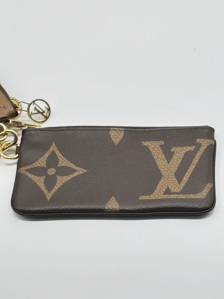 Pre Owned Louis Vuitton Reverse Monogram Giant Trio Pouch