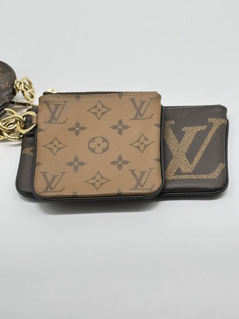 Pre Owned Louis Vuitton Reverse Monogram Giant Trio Pouch