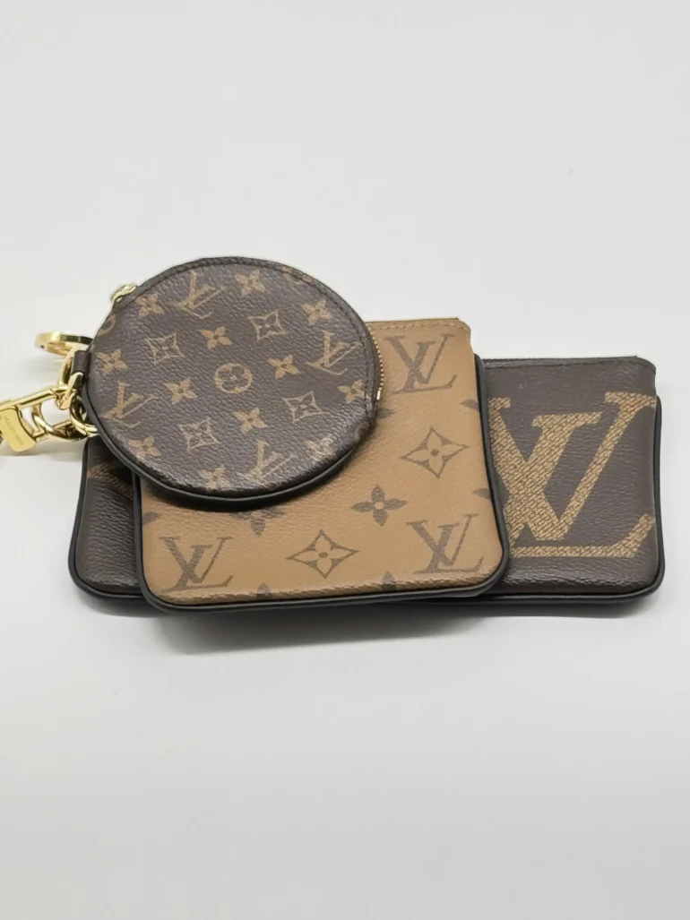 Pre Owned Louis Vuitton Reverse Monogram Giant Trio Pouch