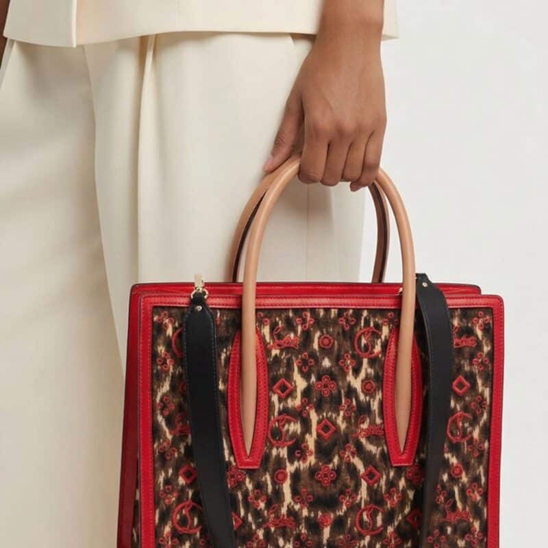 Pre Owned CHRISTIAN LOUBOUTIN Paloma Medium Tote in an embroidered jacquard leopard print.