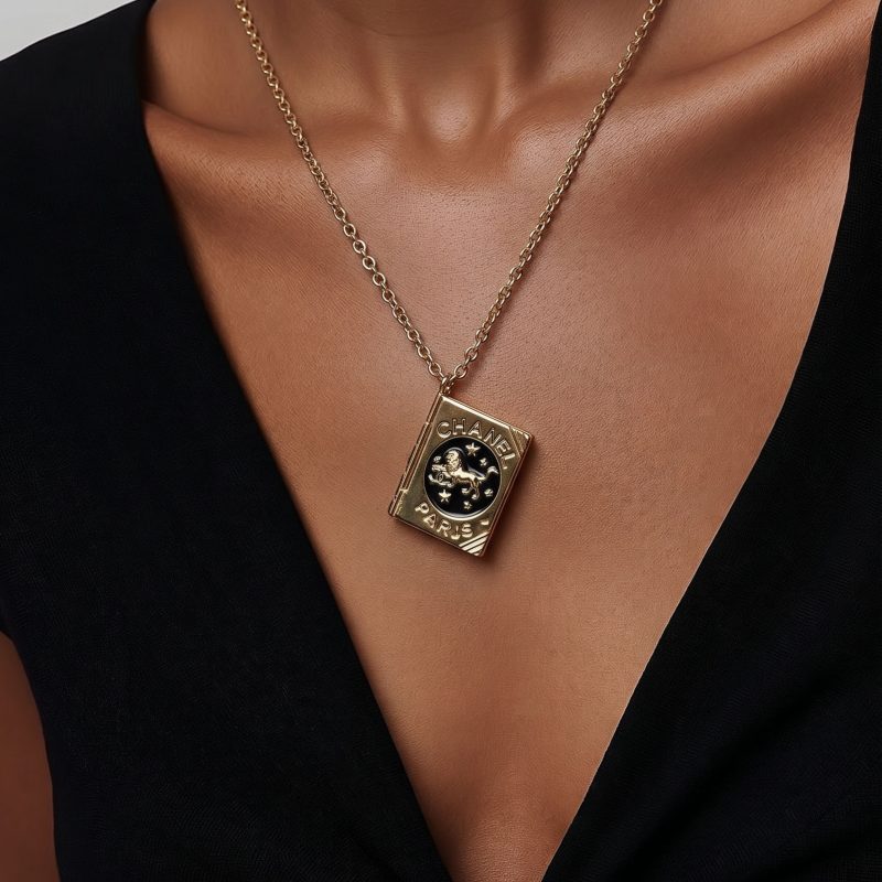 Pre-Owned CHANEL Lion Book Rotary Pendant Necklace